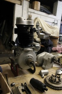 Refurbished BSA C11 1939 engine and gear box amongest other restored parts.